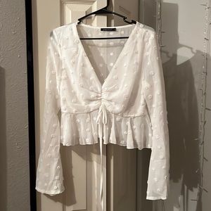 Large white blouse with white fluffy dots